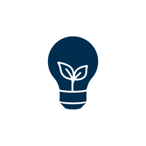 Symbool voor duurzame energie met plant in gloeilamp