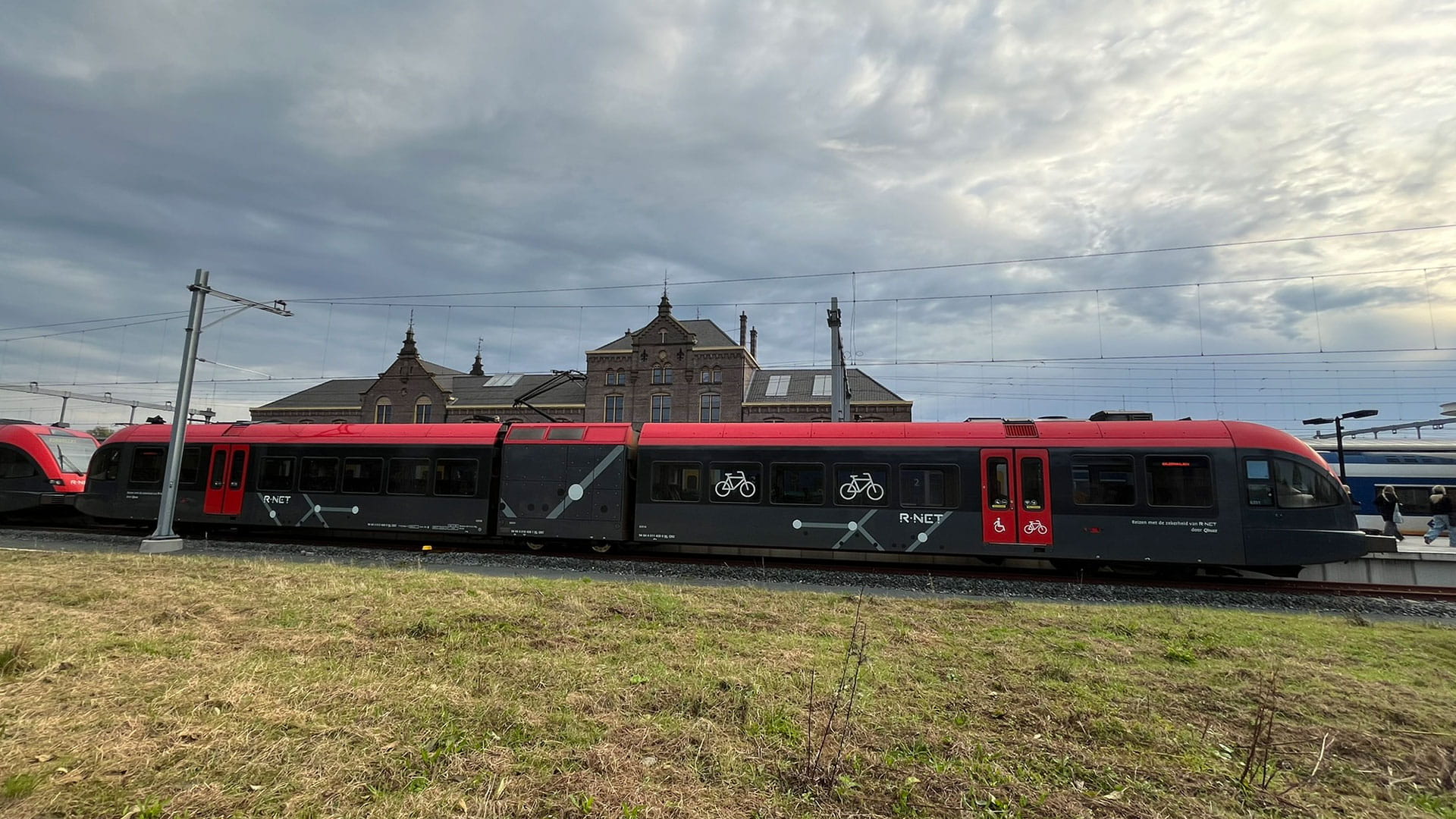 Dutch city Dordrecht with railway bridge over river Oude Maas