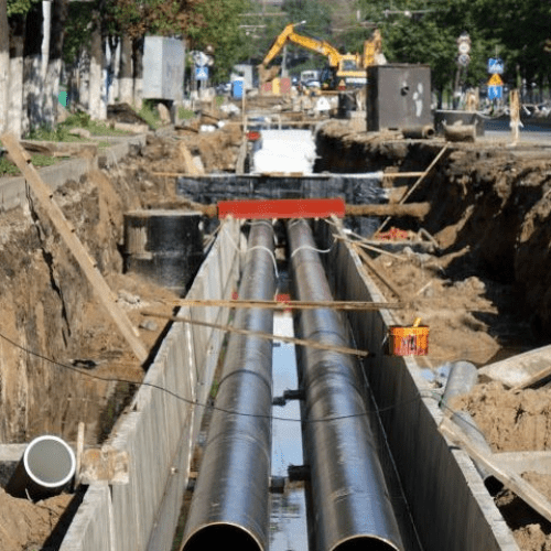 Foto van een straat met werkzaamheden in de grond